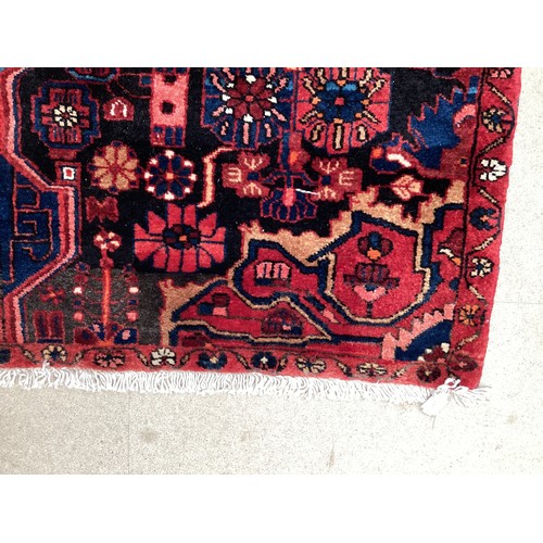 377 - Three small rugs, see photos for details, much wear to edges and all over wear commensurate with use... 