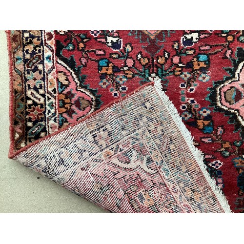 378 - Red ground runner, see photos for details, 96 cm x 297 cm, condition all over wear.