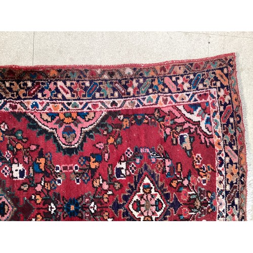 378 - Red ground runner, see photos for details, 96 cm x 297 cm, condition all over wear.