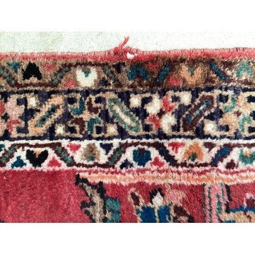 378 - Red ground runner, see photos for details, 96 cm x 297 cm, condition all over wear.