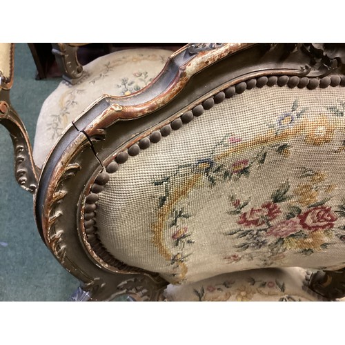 567 - Good Pair of Rococo armchairs with floral tapestry design. 90 cm H. Condition, losses and chips to p... 