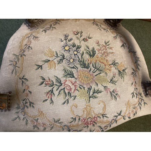 567 - Good Pair of Rococo armchairs with floral tapestry design. 90 cm H. Condition, losses and chips to p... 