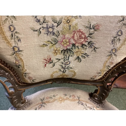 567 - Good Pair of Rococo armchairs with floral tapestry design. 90 cm H. Condition, losses and chips to p... 