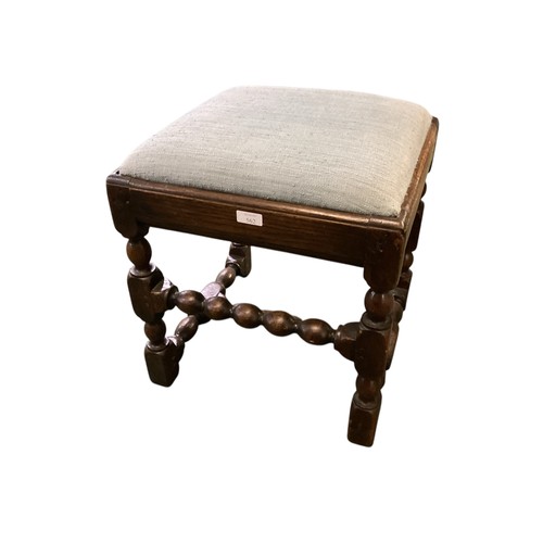 562 - Three items of furniture to include a bobbin turned oak footstool 40.5 cm  x 41.5 cm with drop in up... 