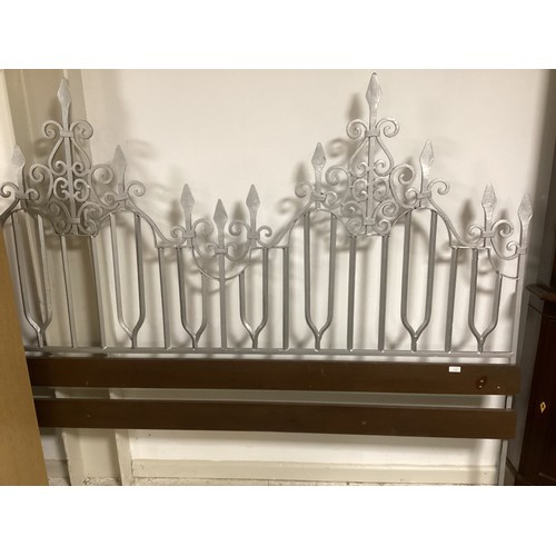 573 - A decorative headboard