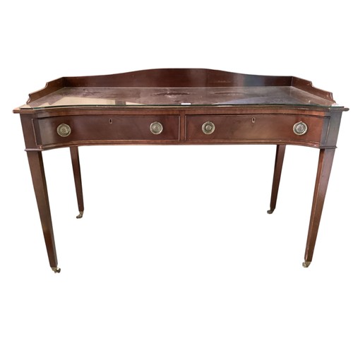 577 - A mahogany concave fronted two drawers serving table, 124cm w x 58cm d x 88cm h