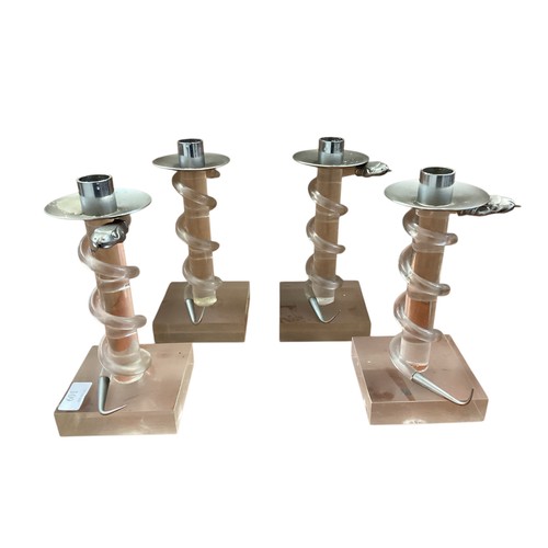 109 - Four Allesandro Albrizzi candlesticks, approx 21cm high overall, in used condition, one candlestick ... 