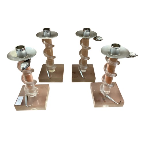 109 - Four Allesandro Albrizzi candlesticks, approx 21cm high overall, in used condition, one candlestick ... 