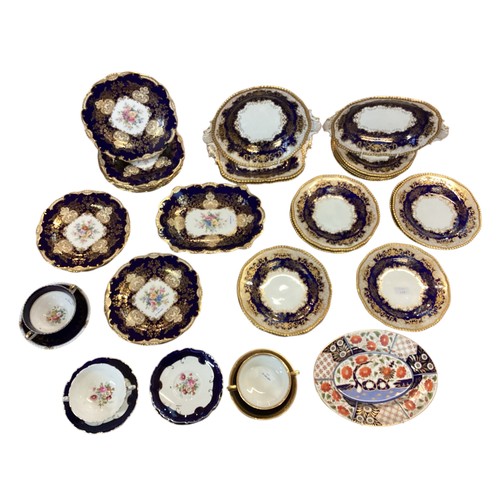 110 - A quantity of decorative blue and gilded china to include T Goode & Co London Bone China  Minton ova... 