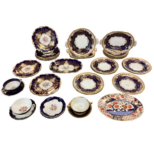 110 - A quantity of decorative blue and gilded china to include T Goode & Co London Bone China  Minton ova... 