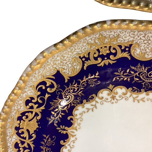 110 - A quantity of decorative blue and gilded china to include T Goode & Co London Bone China  Minton ova... 