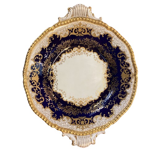 110 - A quantity of decorative blue and gilded china to include T Goode & Co London Bone China  Minton ova... 