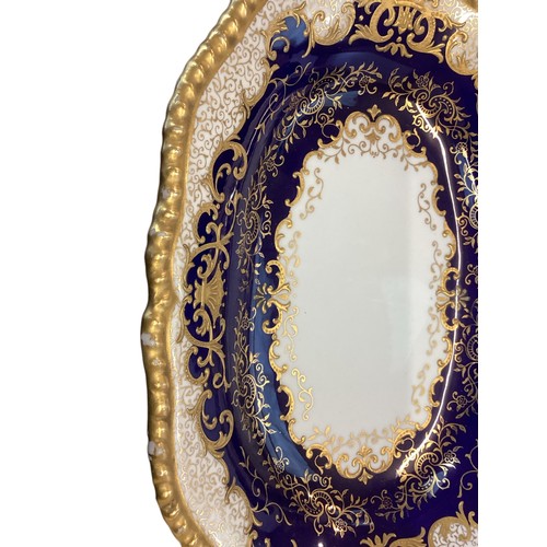 110 - A quantity of decorative blue and gilded china to include T Goode & Co London Bone China  Minton ova... 