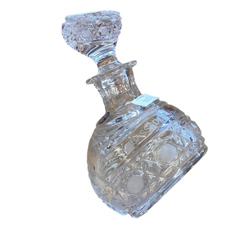 117 - An engraved and etched suite of decanter and 6 glasses, with leaning two edged bases,  the decanter ... 