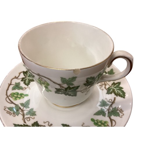 107 - A quantity of china to include: the Royal Worcester Hop, green leaf design part dinner/coffee/ tea s... 