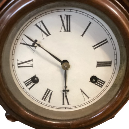 136 - Two clocks: A late C19th mahogany domed mantle clock, label to door inside , New Haven Clock etc, se... 