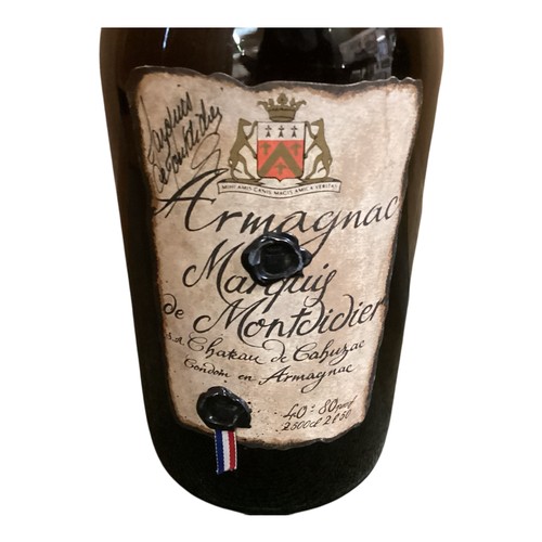 131 - This appear to be modern. A bottle bearing label: 1933 Armagnac Marquis de Montdidier (auctioneers p... 