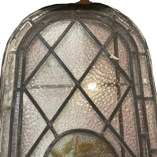 255 - Two pairs of arched lead lined stained glass windows, each with circular etched panels to centre, th... 