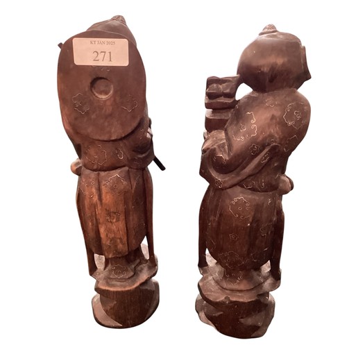 271 - A pair of carved wooden oriental figures, approx 30cm high