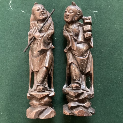 271 - A pair of carved wooden oriental figures, approx 30cm high