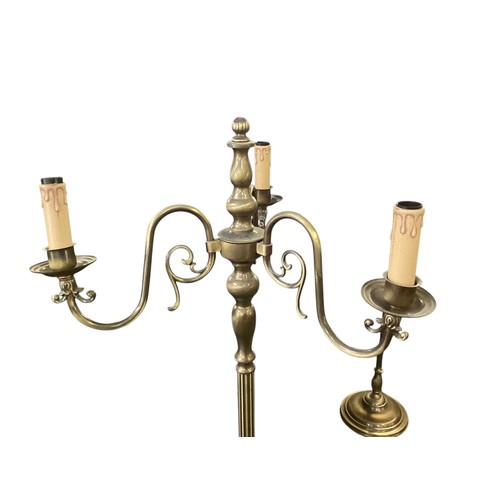 248 - A set of six brass column standard lamps each with 3 branches to faux candles. wired (not tested)