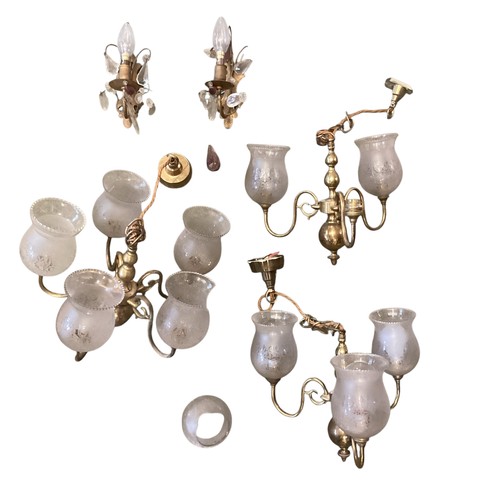 153 - A quantity of lighting to include brass five branch chandeliers  with etched shades