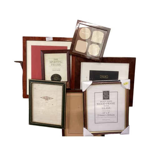 157 - A quantity of decorative picture frames and artwork