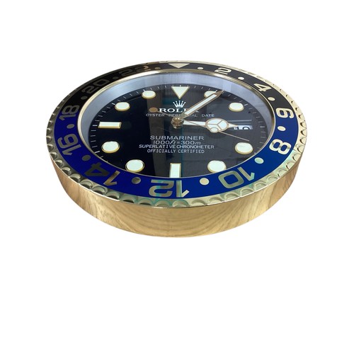 82 - Rolex inspired replica wall clock, Submariner style, black face, black and blue bezel. Condition as ... 