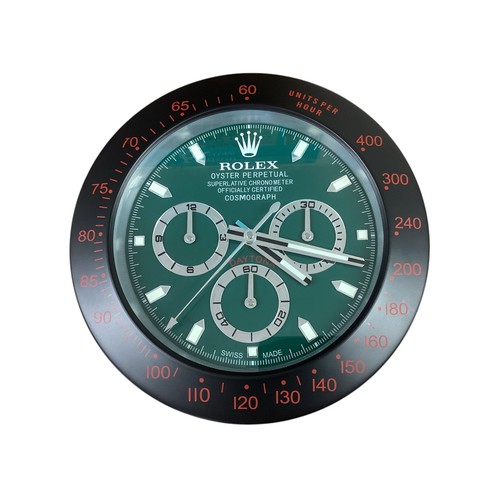 84 - Rolex inspired replica wall clock, Daytona style, green face, black and red bezel. Condition as new,... 