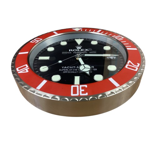 86 - Rolex inspired replica wall clock, Yacht-Master style, black face, red bezel. Condition as new, no g... 