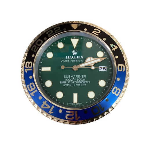 89 - Rolex inspired replica wall clock, Submariner style, green face, black and blue bezel. Condition as ... 