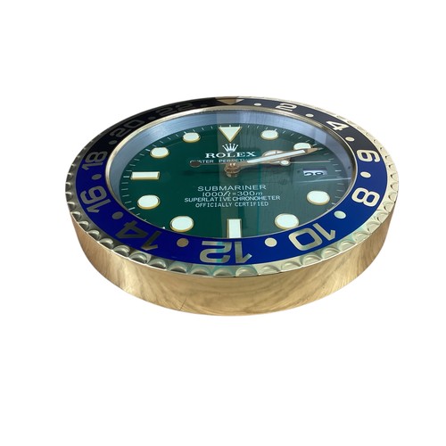 89 - Rolex inspired replica wall clock, Submariner style, green face, black and blue bezel. Condition as ... 