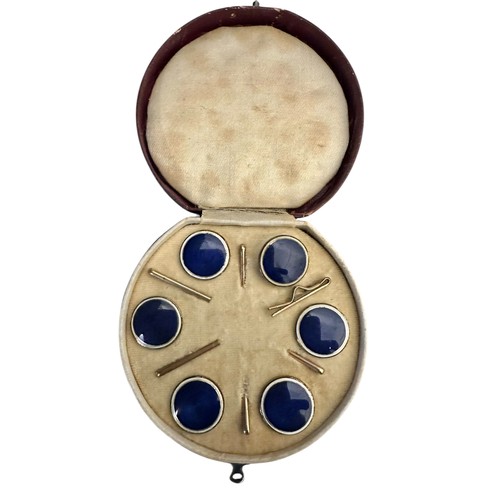 4 - A fitted circular cased presentation box containing 6 blue enamel style circular studs