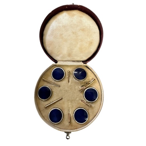 4 - A fitted circular cased presentation box containing 6 blue enamel style circular studs