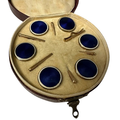 4 - A fitted circular cased presentation box containing 6 blue enamel style circular studs