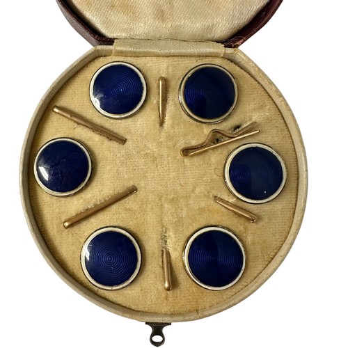 4 - A fitted circular cased presentation box containing 6 blue enamel style circular studs