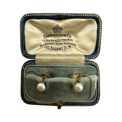 8 - A Carrington & Co cased presentation box with two pearl and 18ct gold studs, box stamped Carrington ... 