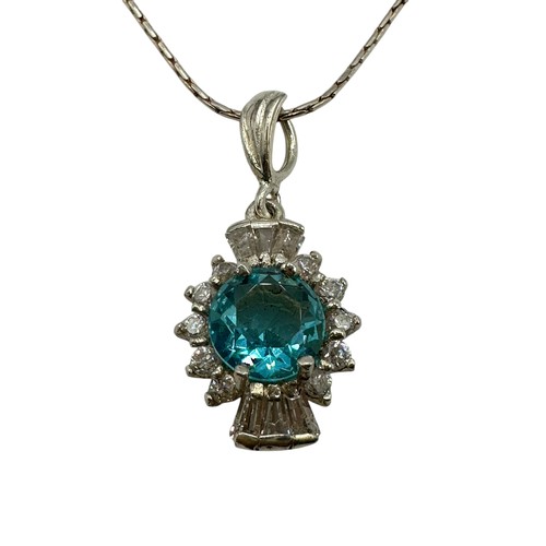 55 - A silver necklace with pendant, thistle shaped with blue stone, and matching earrings