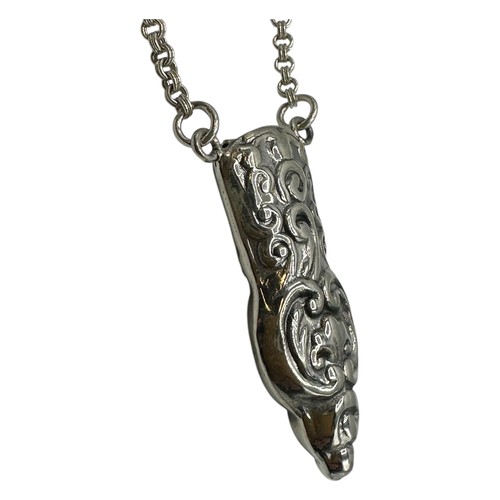 56 - A silver Repousse pendant