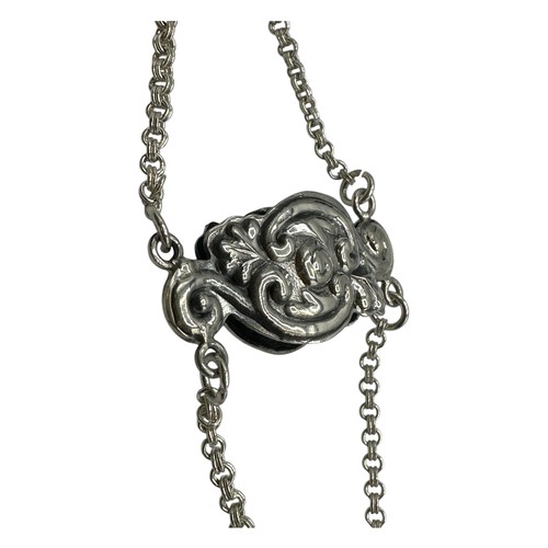 56 - A silver Repousse pendant