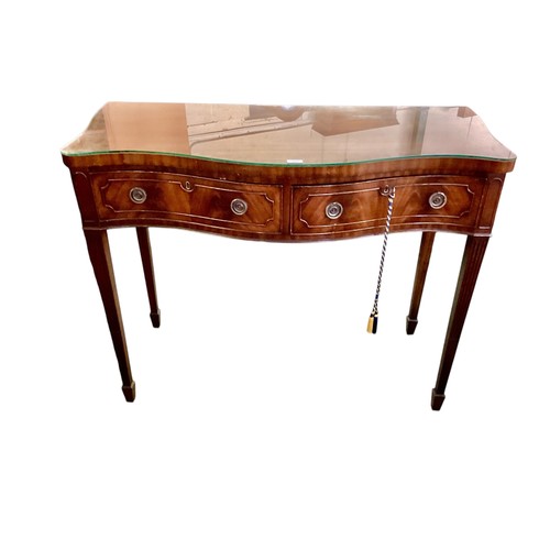 513 - A Pair of C19th serpentine fronted mahogany side tables, glass tops,  115cm wide x 55cm deep x 88cm ... 