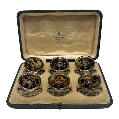 46 - A fine set of GARRARD & CO Ltd, hallmarked silver and tortoiseshell place holders, each holder with ... 