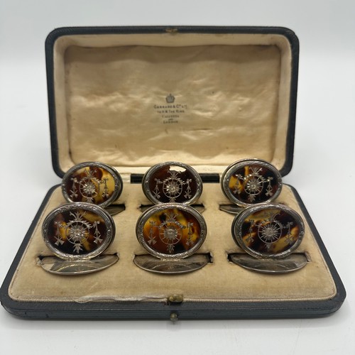 46 - A fine set of GARRARD & CO Ltd, hallmarked silver and tortoiseshell place holders, each holder with ... 