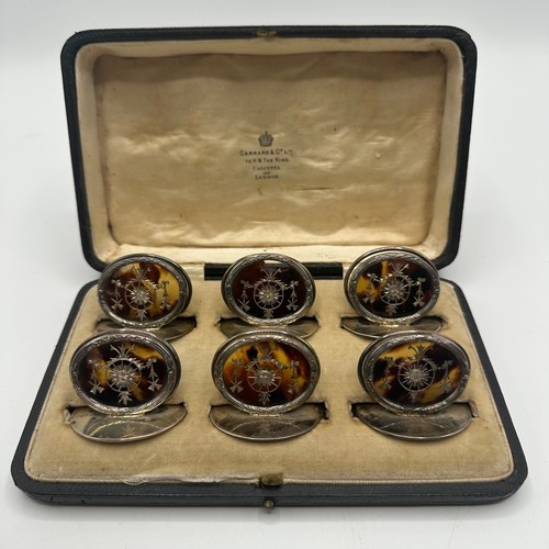 46 - A fine set of GARRARD & CO Ltd, hallmarked silver and tortoiseshell place holders, each holder with ... 