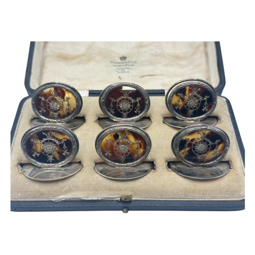 46 - A fine set of GARRARD & CO Ltd, hallmarked silver and tortoiseshell place holders, each holder with ... 