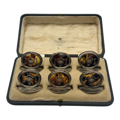 46 - A fine set of GARRARD & CO Ltd, hallmarked silver and tortoiseshell place holders, each holder with ... 