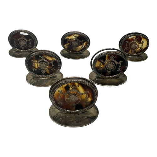 46 - A fine set of GARRARD & CO Ltd, hallmarked silver and tortoiseshell place holders, each holder with ... 