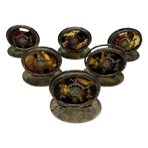 46 - A fine set of GARRARD & CO Ltd, hallmarked silver and tortoiseshell place holders, each holder with ... 