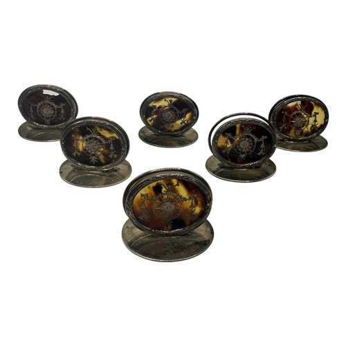 46 - A fine set of GARRARD & CO Ltd, hallmarked silver and tortoiseshell place holders, each holder with ... 