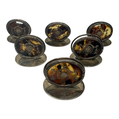 46 - A fine set of GARRARD & CO Ltd, hallmarked silver and tortoiseshell place holders, each holder with ... 